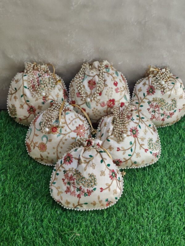 White Embroidery potlis