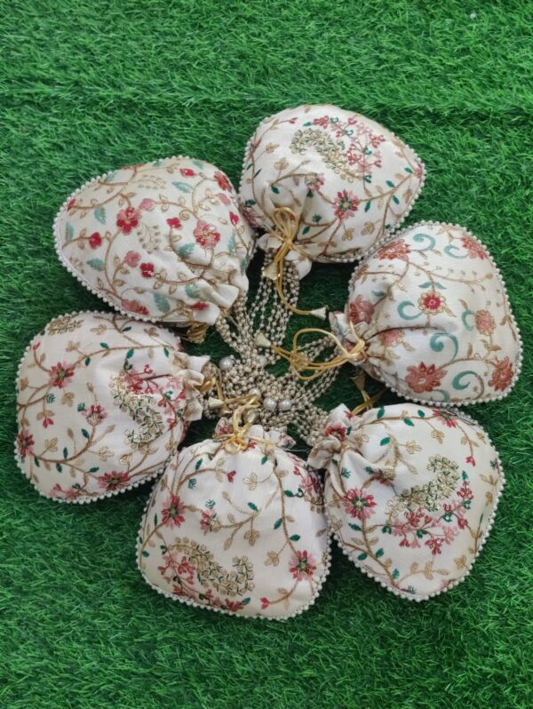 White Embroidery potlis - Image 2