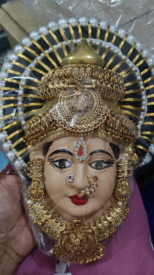 German silver face with Tanjore painted with heavy jewellery*