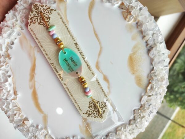 Resin art customised Rakhi - Image 4