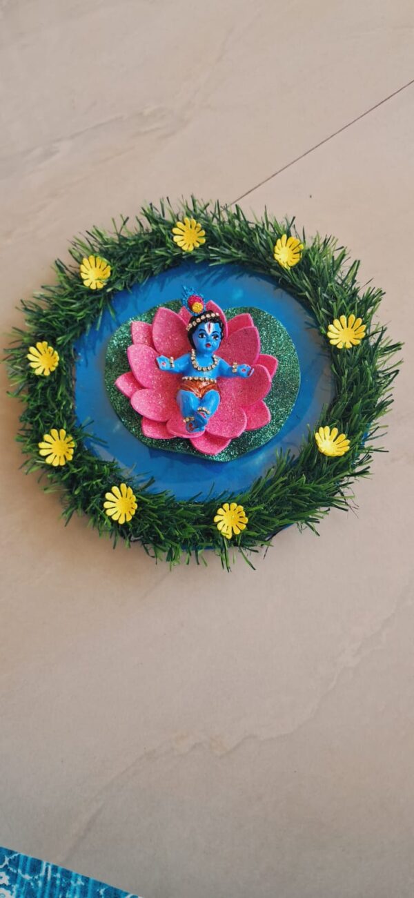 Baby krishna in lotus with pond effect